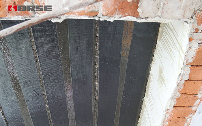 Sistem perbaikan beton bungkus serat karbon