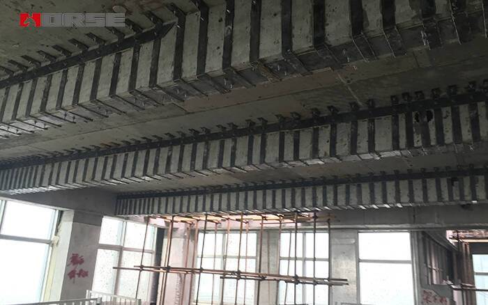 Penguatan Beton Berkuatan (RC) Beam Dengan Pelat Baja
