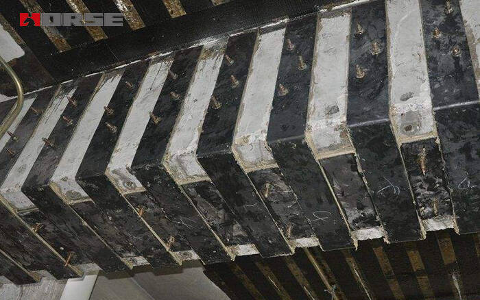 Penguatan balok dan kolom dengan pelat baja perekat
