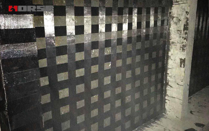 lempeng retrofitting dengan bungkus FRP