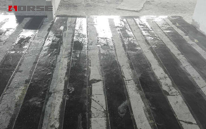 penguatan lempeng dengan bungkus polimer yang diperkuat serat