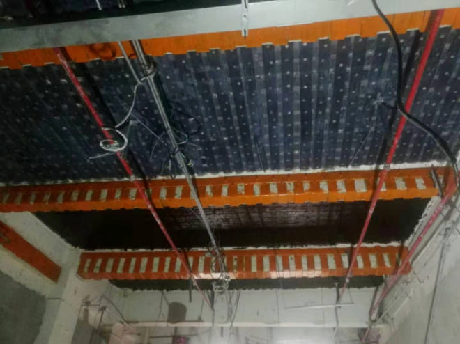 Penguatan Serat Karbon dan Perbaikan Bangunan Genteng Hijau