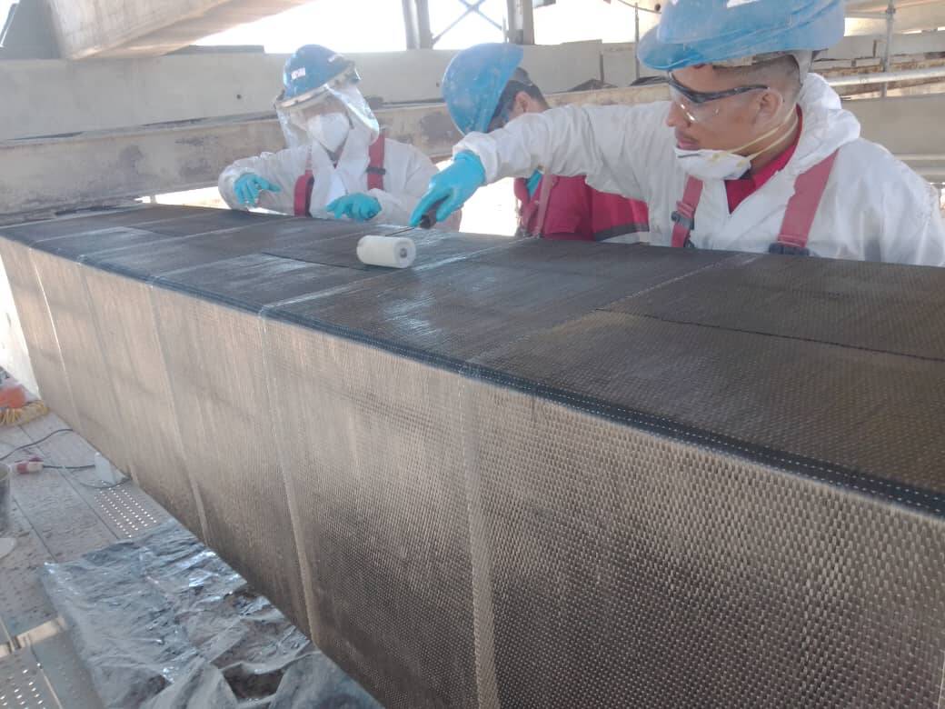 Rehabilitasi Balok Beton Bertulang yang Rusak dengan Kain Serat Karbon Unidirectional HM-30