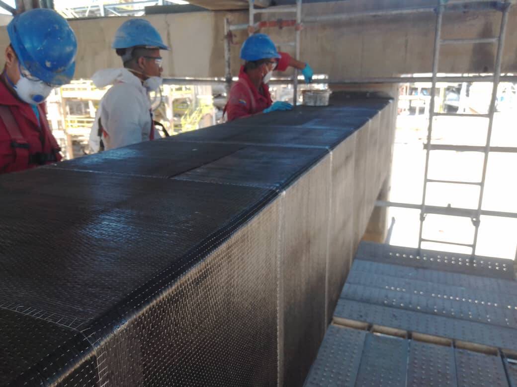 Rehabilitasi Balok Beton Bertulang yang Rusak dengan Kain Serat Karbon Unidirectional HM-30