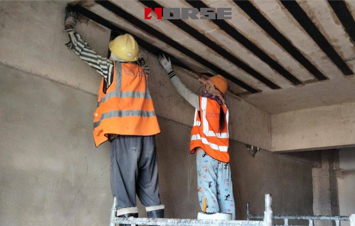 Penguatan lembaran dengan serat karbon