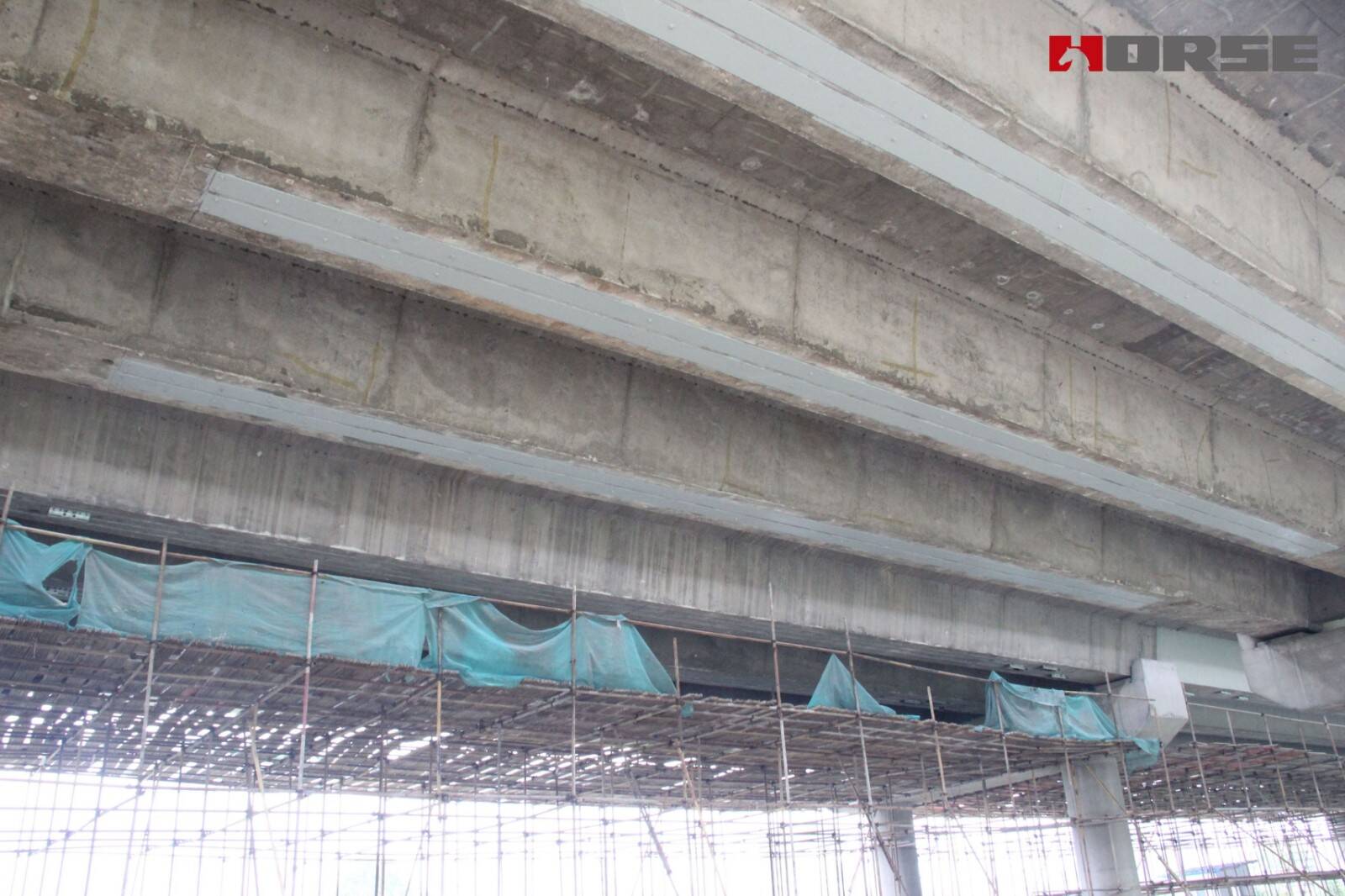 Solusi untuk Perbaikan Retak Jembatan - Plat Baja Berikat Epoxy