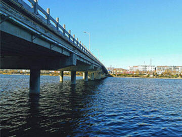 Penerapan teknologi jembatan perkuatan baru dengan pelat CFRP prategang