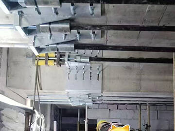 Penguatan Jembatan Dengan Penjangkaran Lingkaran Pelat Karbon Prategang