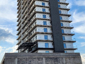 Penguatan Lubang di Apartemen dengan Serat Karbon